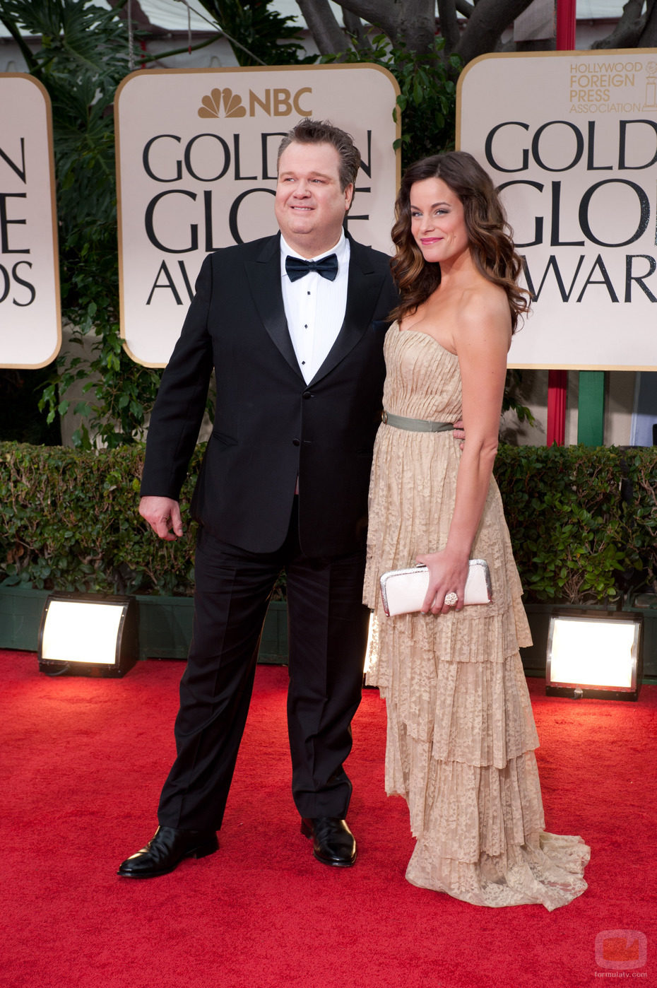 Eric Stonestreet y Katherine Tokarz en los Globos de Oro 2012