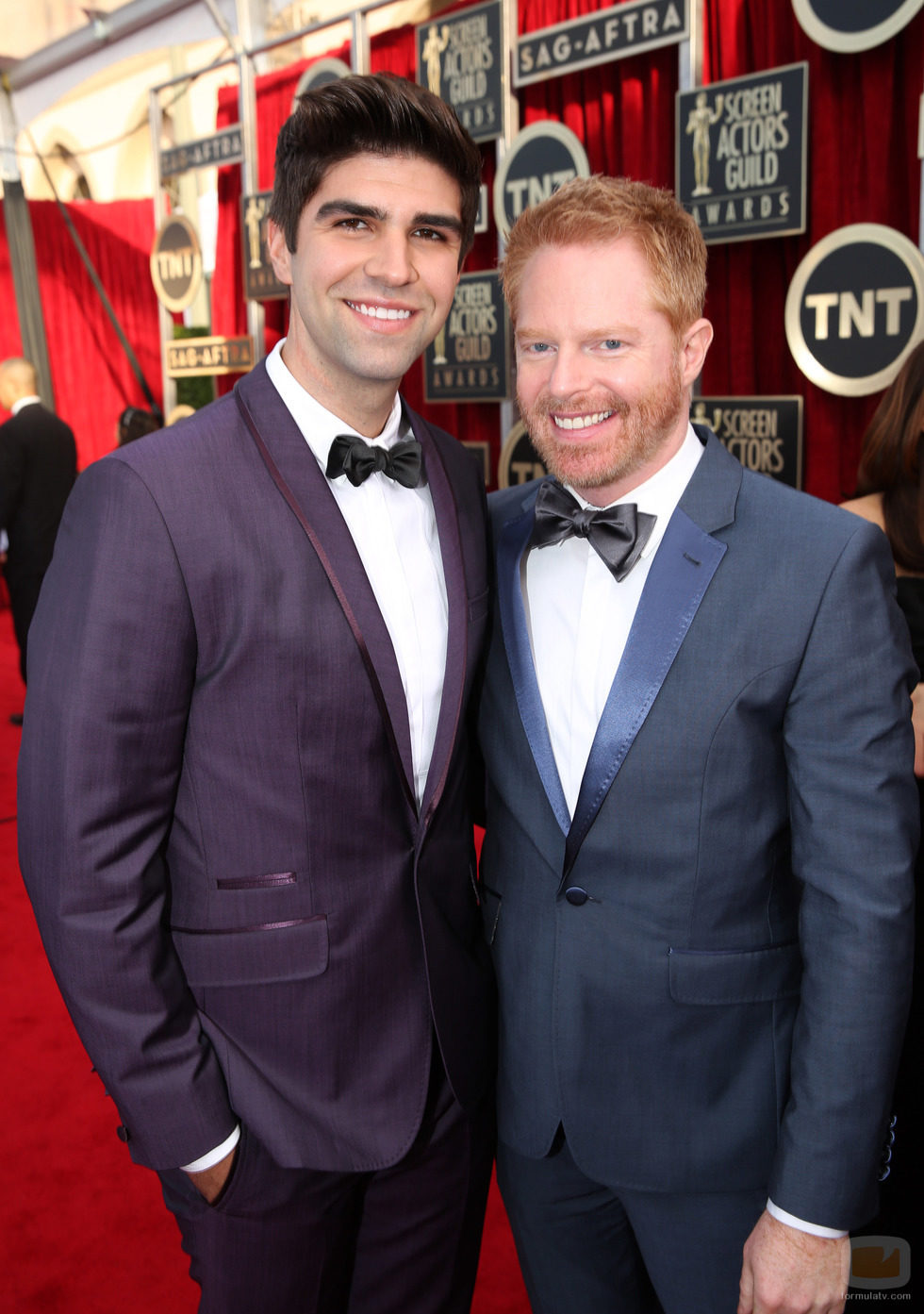 Justin Mikita y Jesse Tyler Ferguson en los SAG 2014